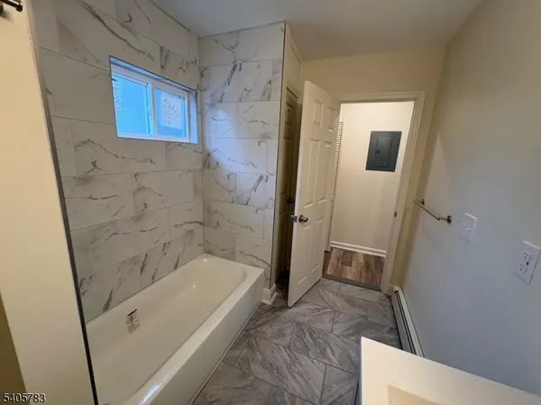 a bathroom with a bathtub