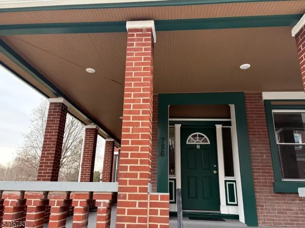 a front view of a house with a door