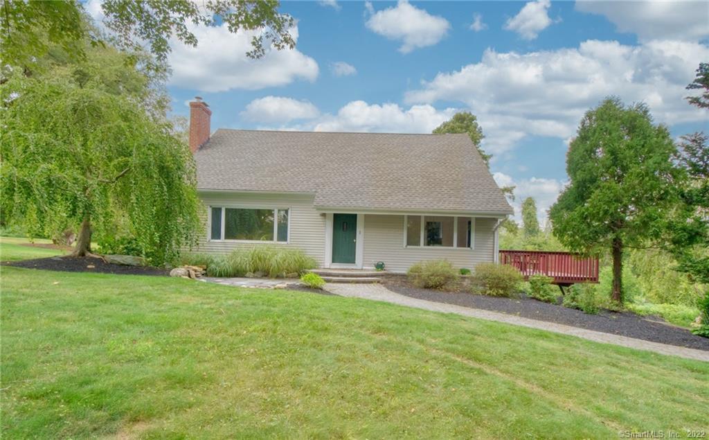 27 Banner Road East Haddam, CT 06469 - Photo 1 of 1 a front view of a house with garden