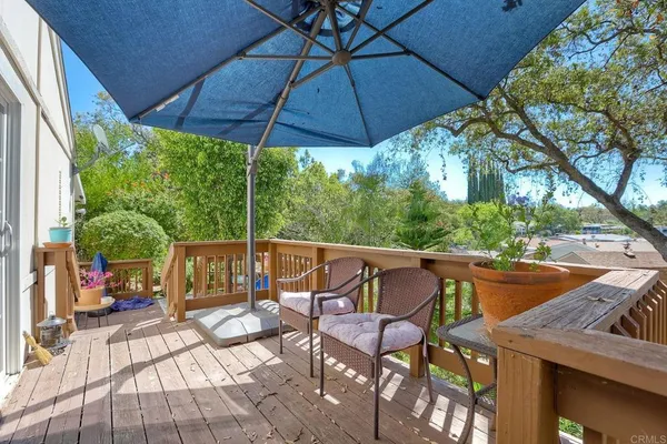 a view of yard with patio