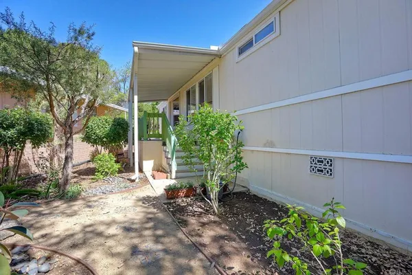 a view of a house with a garden