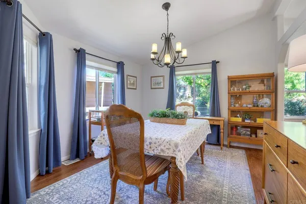 a view of a dining room with furniture window and outside view