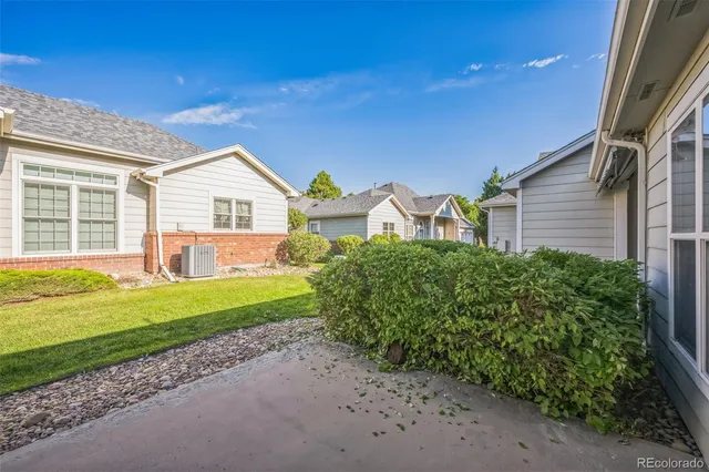 a view of a house with a garden