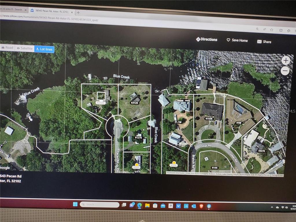 56544 Pecan Road Astor, FL 32102 - Photo 10 of 18 a view of a back yard