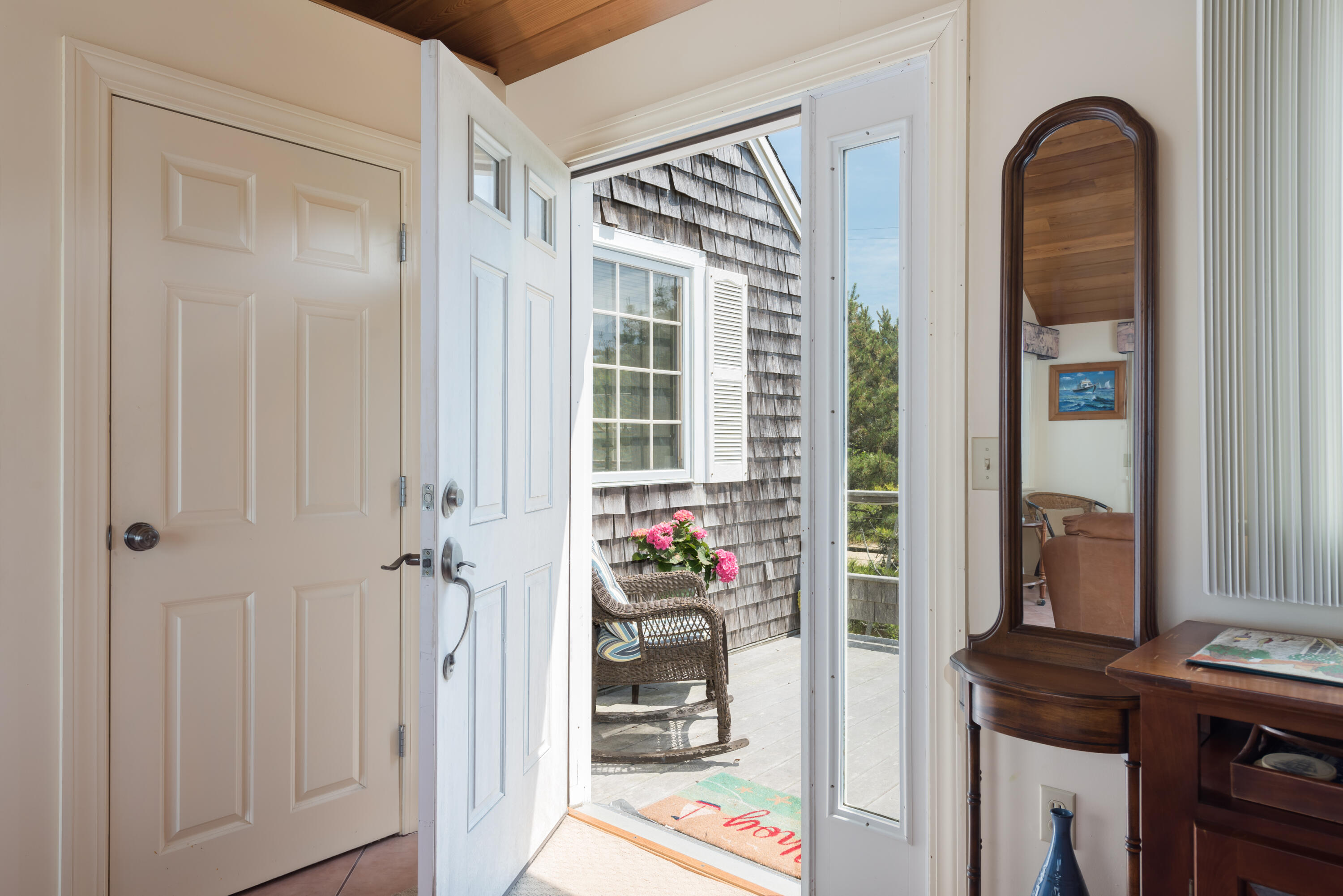 85 Sparrow Road Eastham, MA 02642 - Photo 13 of 43 a view of a livingroom with wooden floor and a window