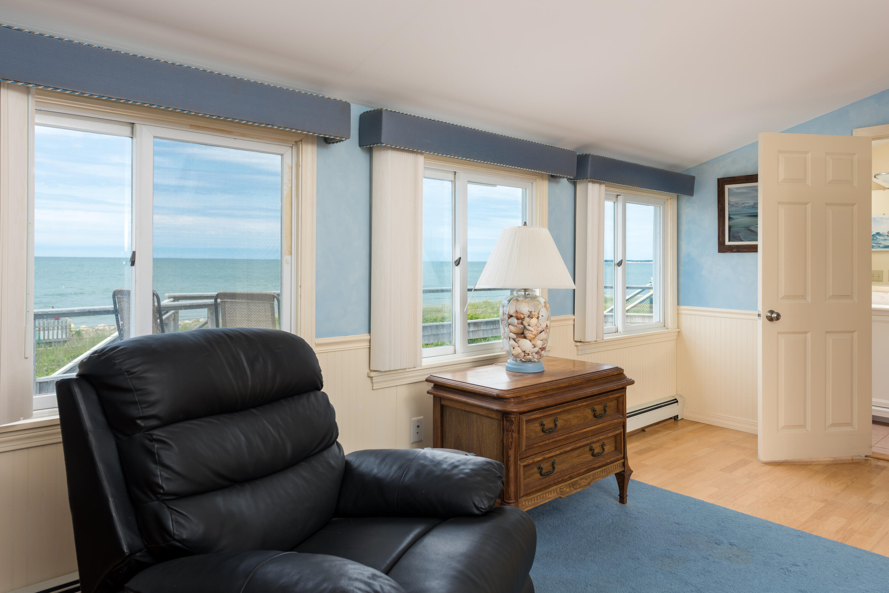 85 Sparrow Road Eastham, MA 02642 - Photo 18 of 43 a living room with furniture and a window