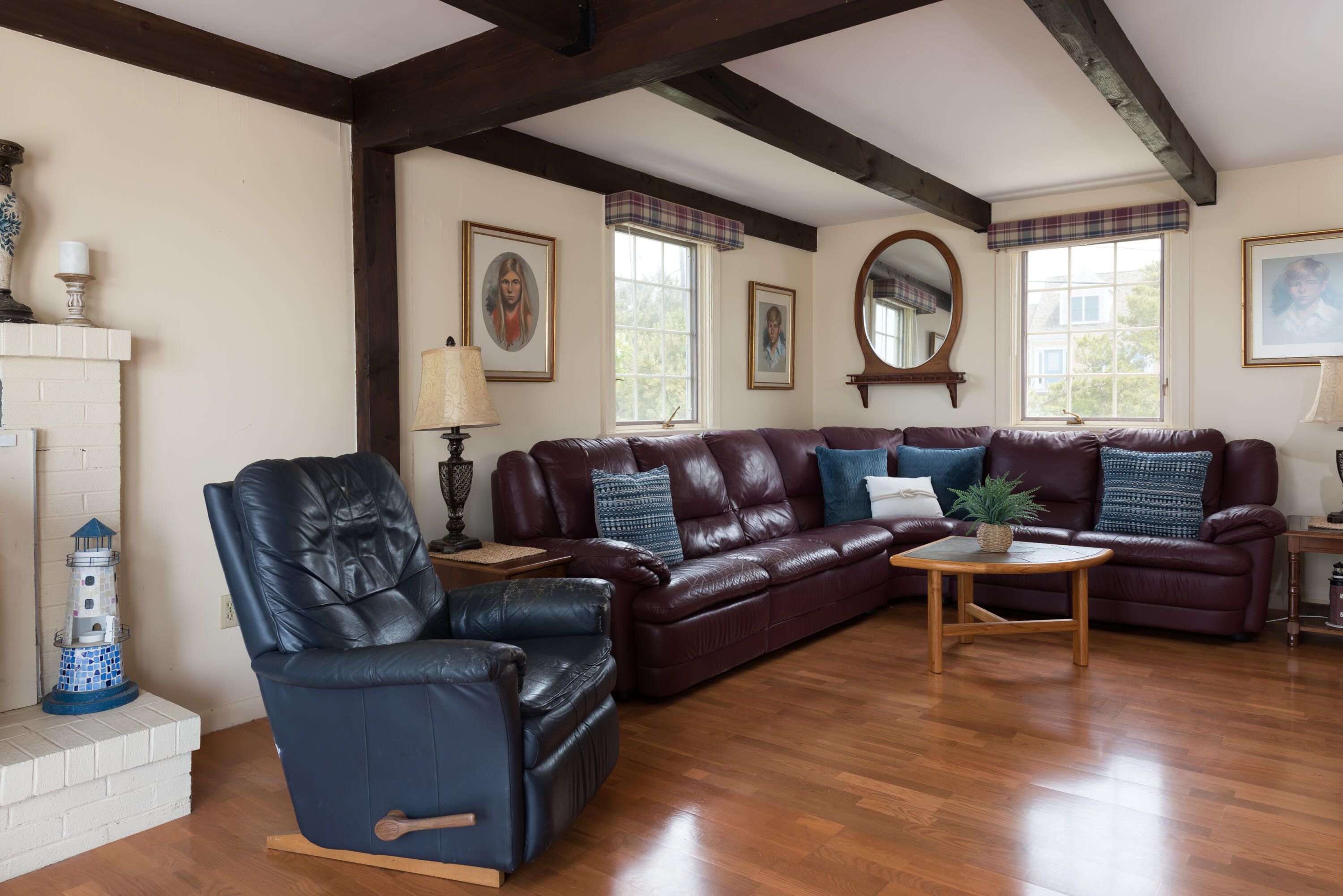 85 Sparrow Road Eastham, MA 02642 - Photo 24 of 43 a living room with furniture and a large window