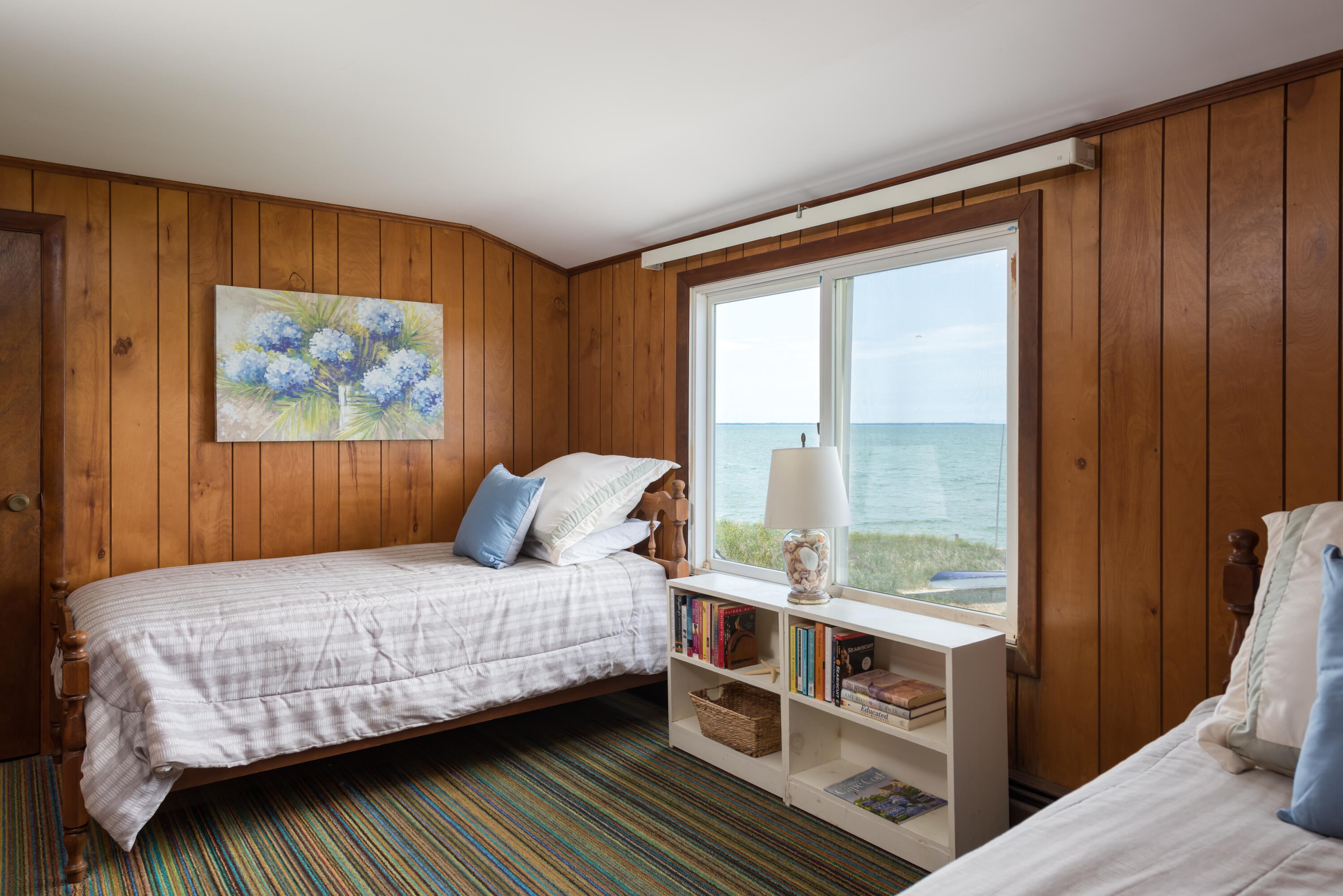 85 Sparrow Road Eastham, MA 02642 - Photo 27 of 43 a bedroom with a bed and a window