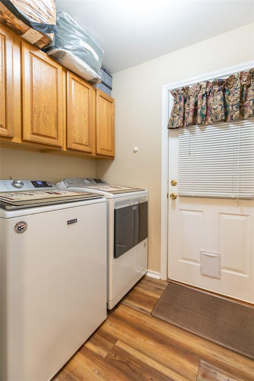 1603 Derrick Drive Haskell, TX 79521 - Photo 12 of 37 a utility room with washer and dryer