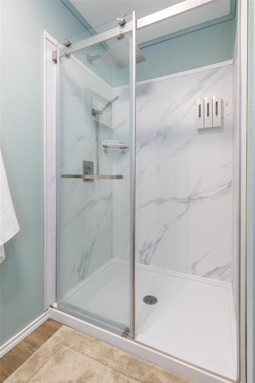 1603 Derrick Drive Haskell, TX 79521 - Photo 20 of 37 a bathroom with a glass shower door