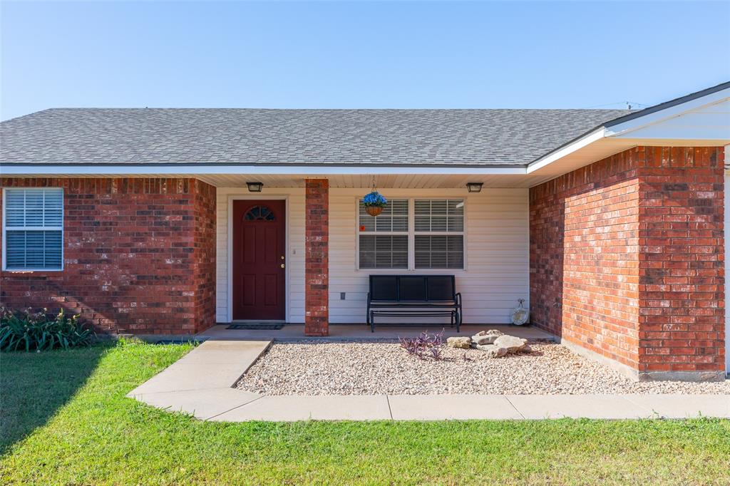 1603 Derrick Drive Haskell, TX 79521 - Photo 29 of 37 a front view of a house with garden