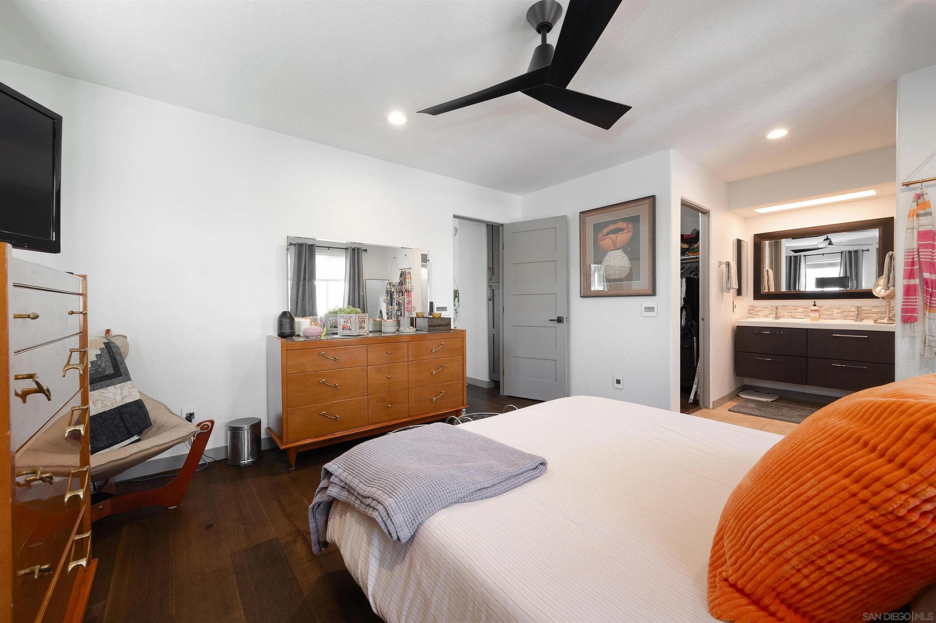 13947 Midland Road Poway, CA 92064 - Photo 11 of 22 a bedroom with a bed and a flat screen tv