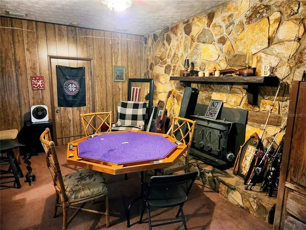 a patio with table and chairs