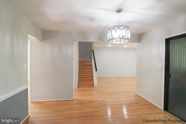 a view of entryway with wooden floor