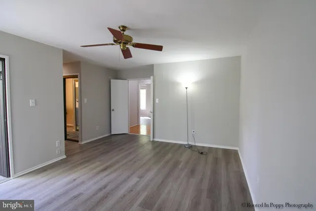 a view of a bathroom from the hallway