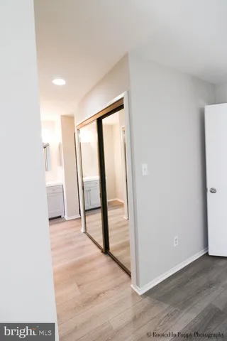 a bathroom with a glass shower door