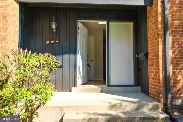 a bathroom with a tub and shower