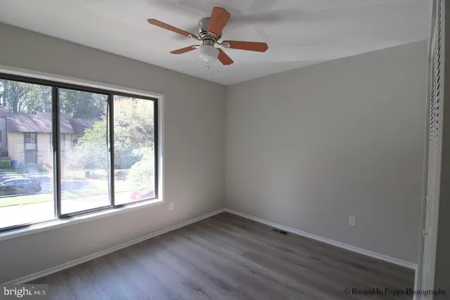 a view of entryway with wooden floor
