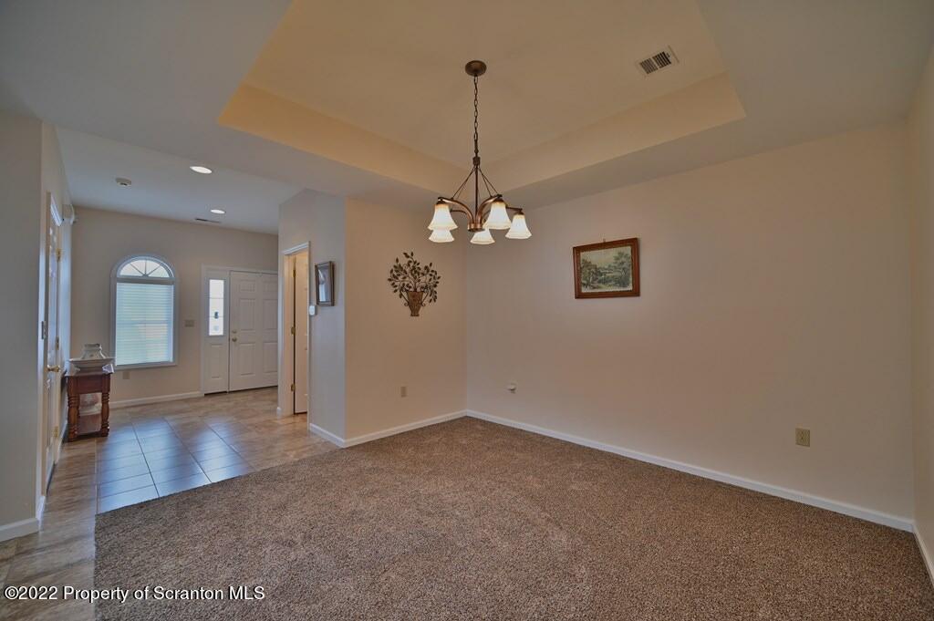 133 Pierce Street Eynon, PA 18403 - Photo 13 of 55 a view of a chandelier in big room and chandelier