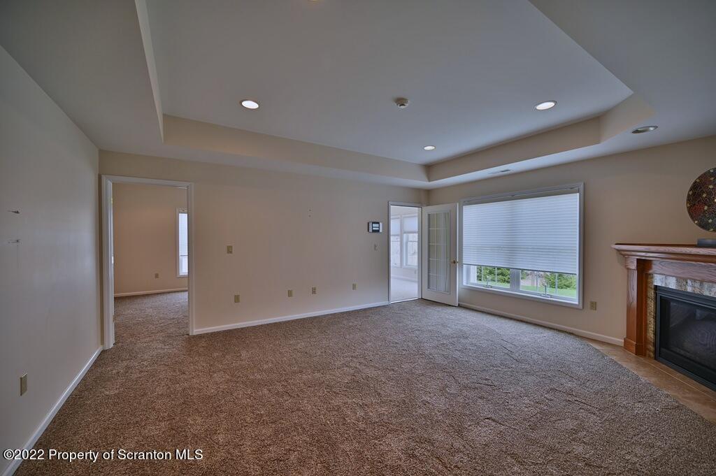 133 Pierce Street Eynon, PA 18403 - Photo 20 of 55 a view of empty room with a fireplace