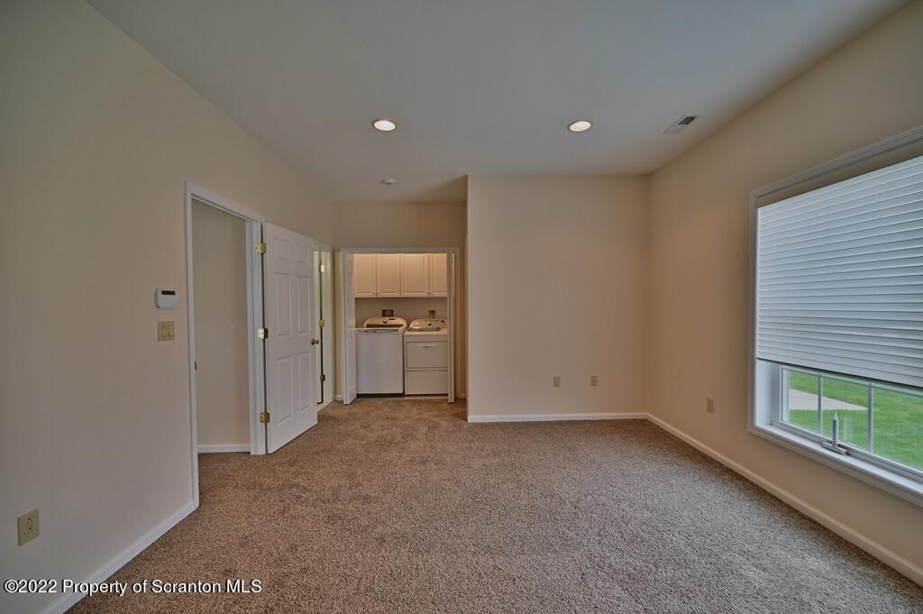 133 Pierce Street Eynon, PA 18403 - Photo 27 of 55 a view of a kitchen with a refrigerator a sink and a window