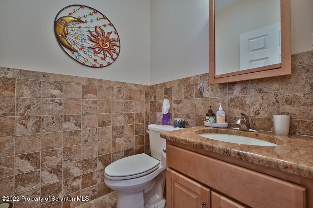 133 Pierce Street Eynon, PA 18403 - Photo 35 of 55 a bathroom with a toilet and a sink