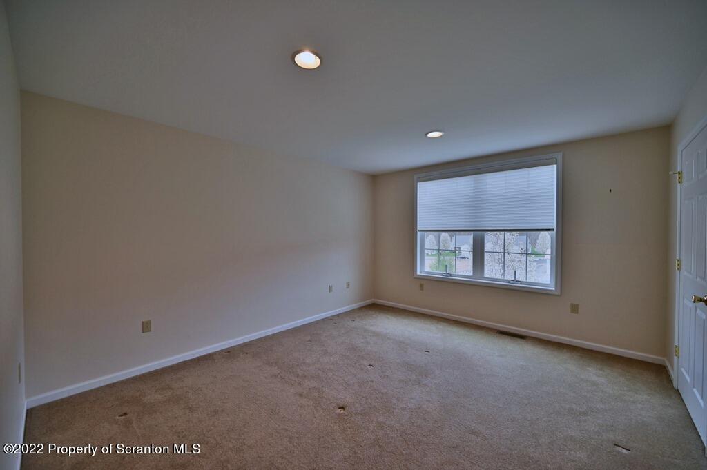 133 Pierce Street Eynon, PA 18403 - Photo 39 of 55 a view of an empty room with a window