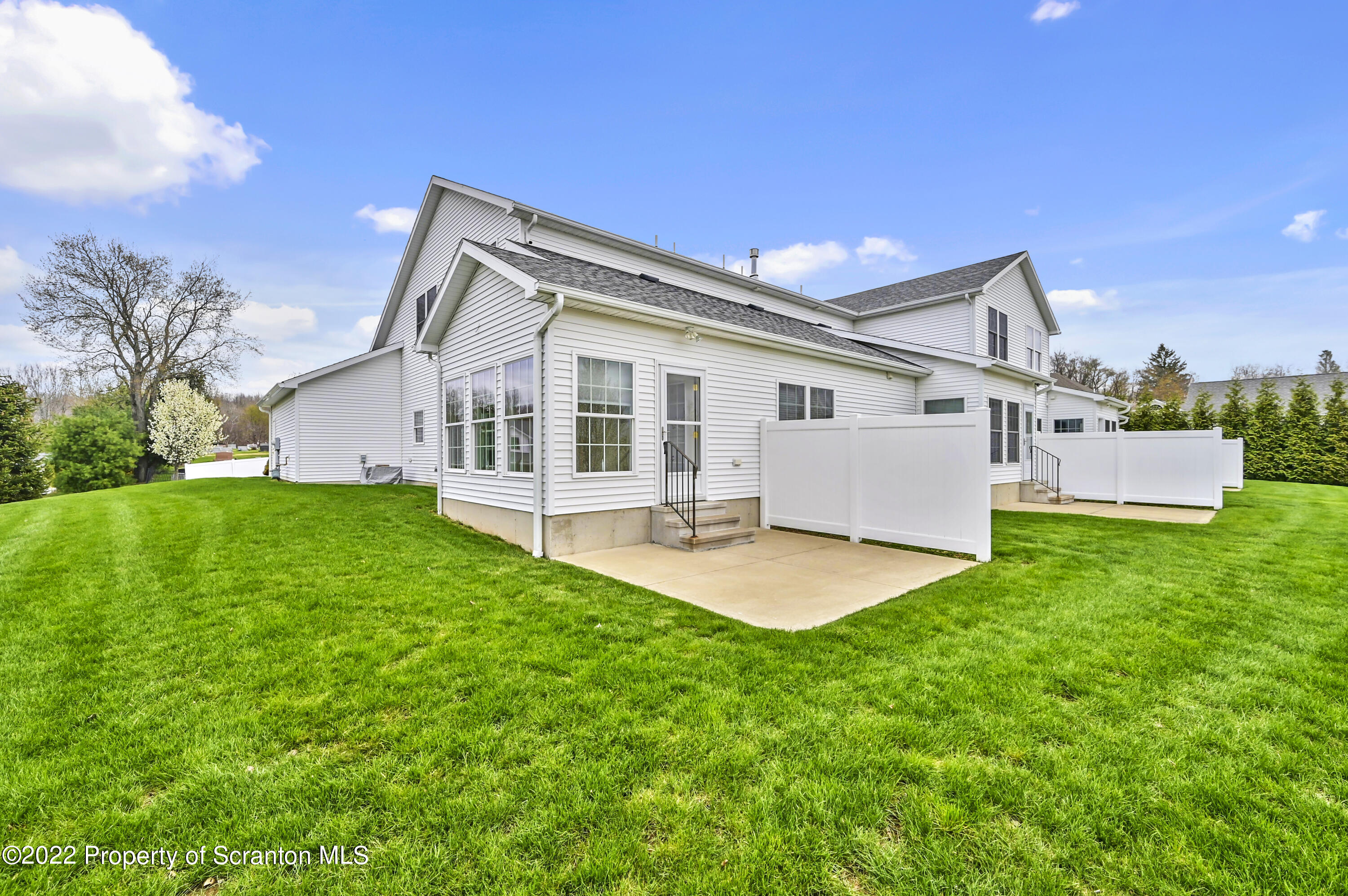 133 Pierce Street Eynon, PA 18403 - Photo 4 of 55 a view of an house with backyard and porch
