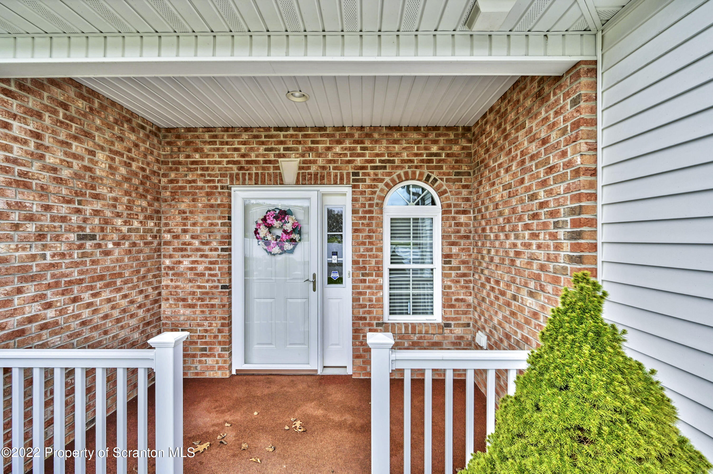 133 Pierce Street Eynon, PA 18403 - Photo 5 of 55 a front view of a house with plants