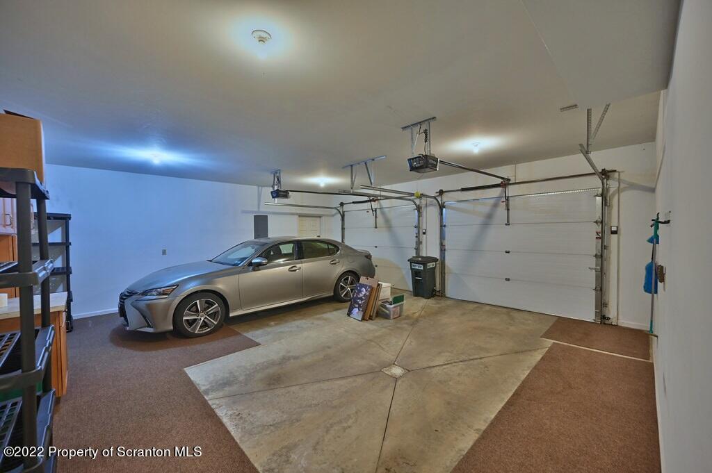 133 Pierce Street Eynon, PA 18403 - Photo 51 of 55 a car parked in a garage