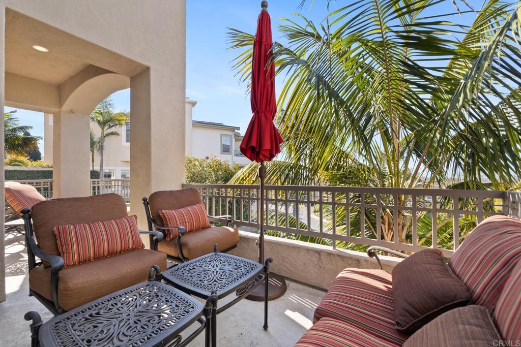 2721 MacKinnon Ranch Road Cardiff-by-the-Sea, CA 92007 - Photo 23 of 38 a living room with furniture and a couch