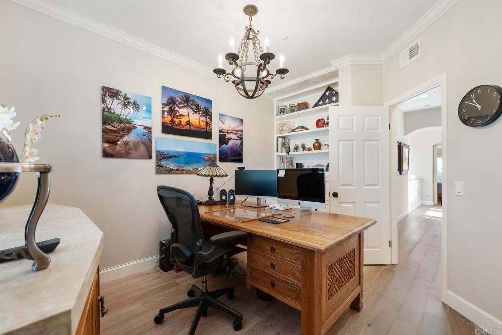 2721 MacKinnon Ranch Road Cardiff-by-the-Sea, CA 92007 - Photo 27 of 38 a view of a workspace with furniture and a window