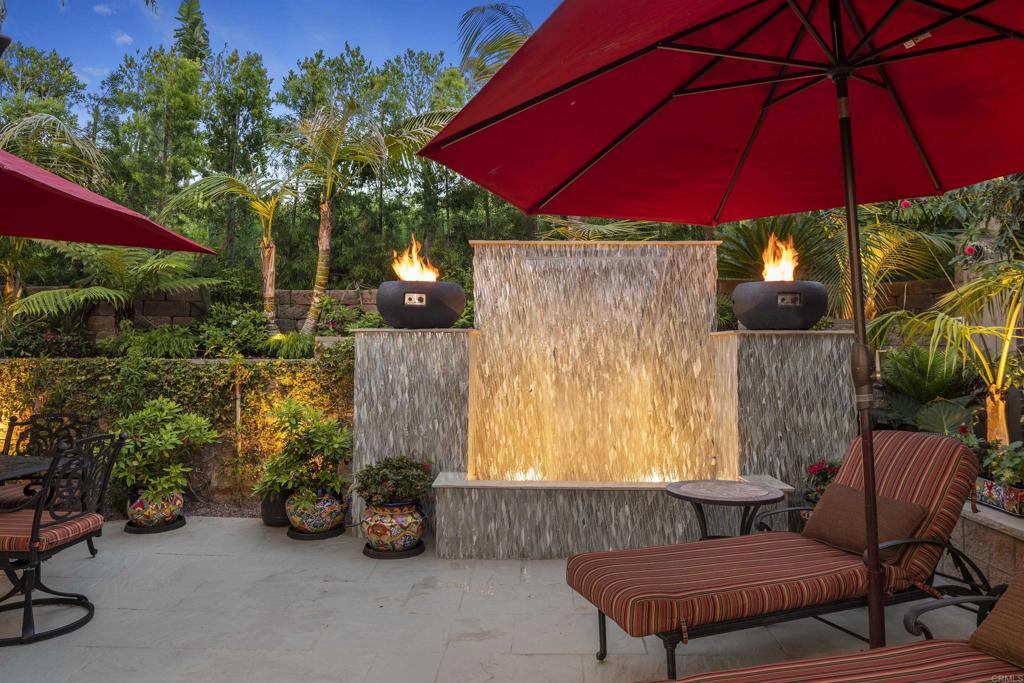 2721 MacKinnon Ranch Road Cardiff-by-the-Sea, CA 92007 - Photo 29 of 38 a view of yard with patio and outdoor seating