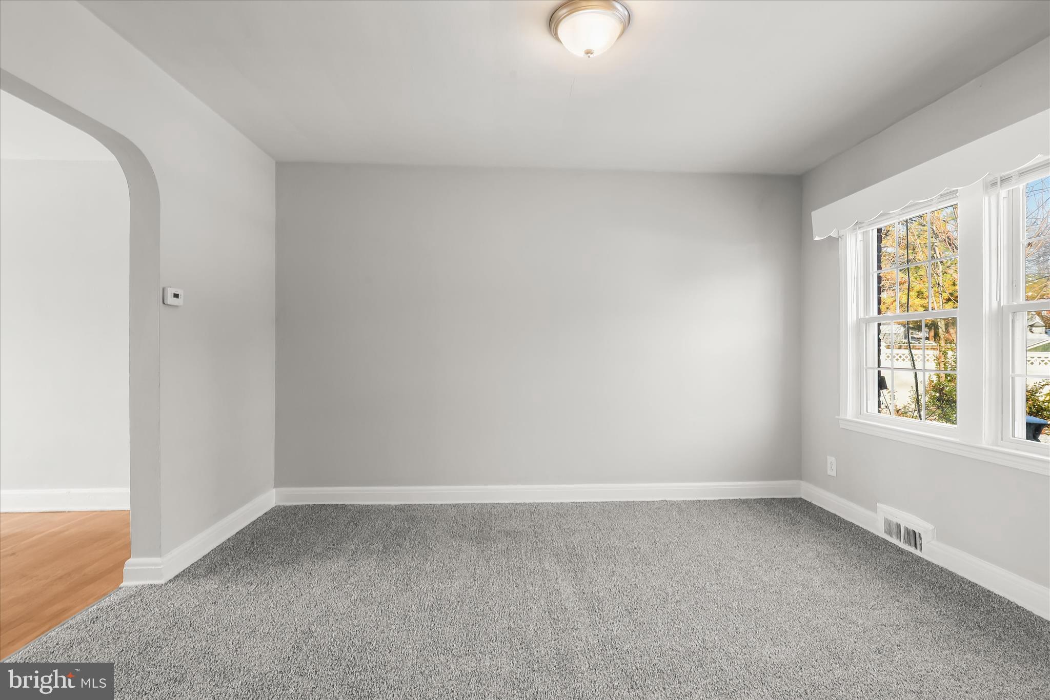 1945 Edgewood Road Towson, MD 21286 - Photo 11 of 46 an empty room with a window