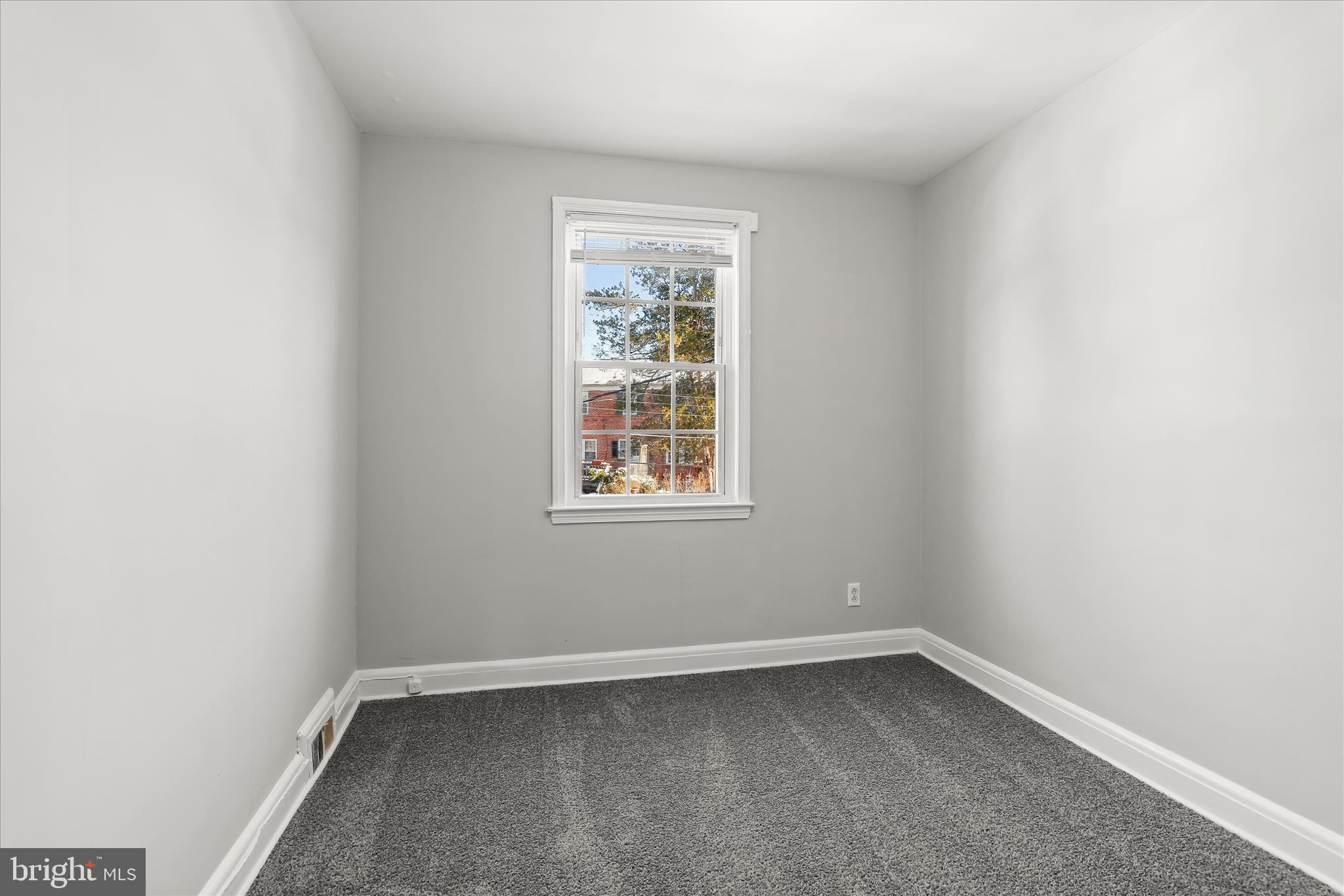 1945 Edgewood Road Towson, MD 21286 - Photo 26 of 46 an empty room with a window