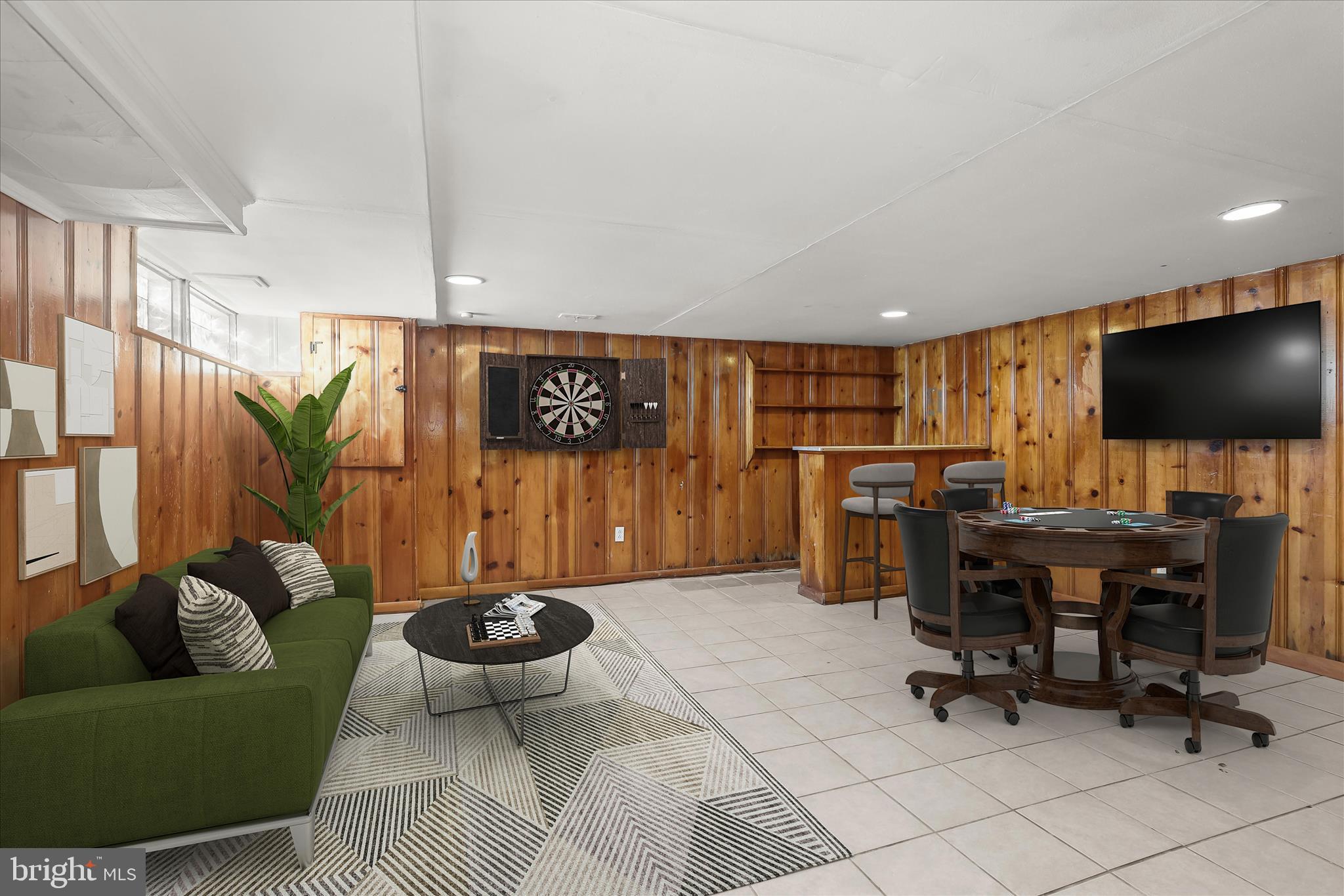 1945 Edgewood Road Towson, MD 21286 - Photo 30 of 46 a living room with furniture and a flat screen tv