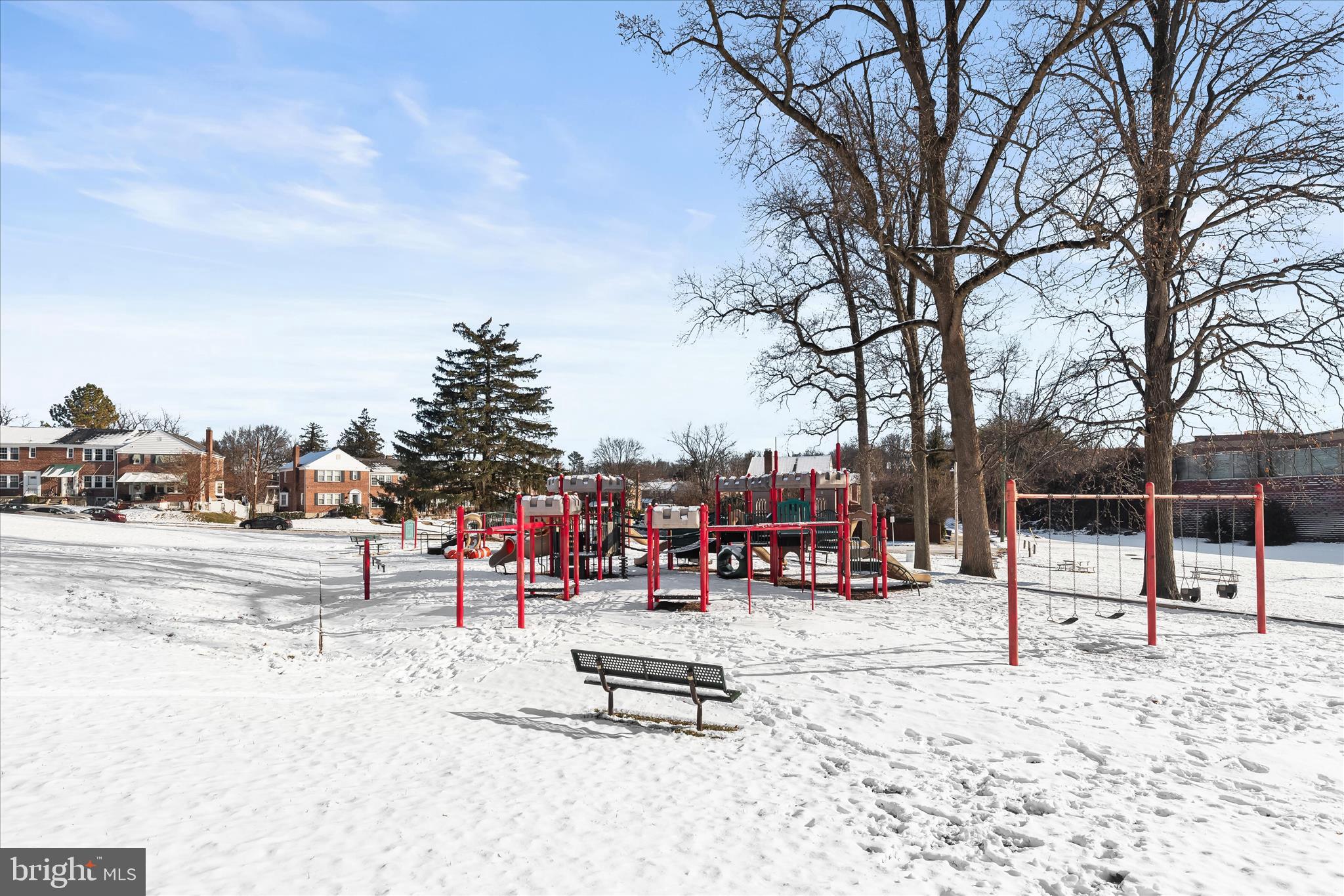 1945 Edgewood Road Towson, MD 21286 - Photo 40 of 46 a view of a park with swings and slides