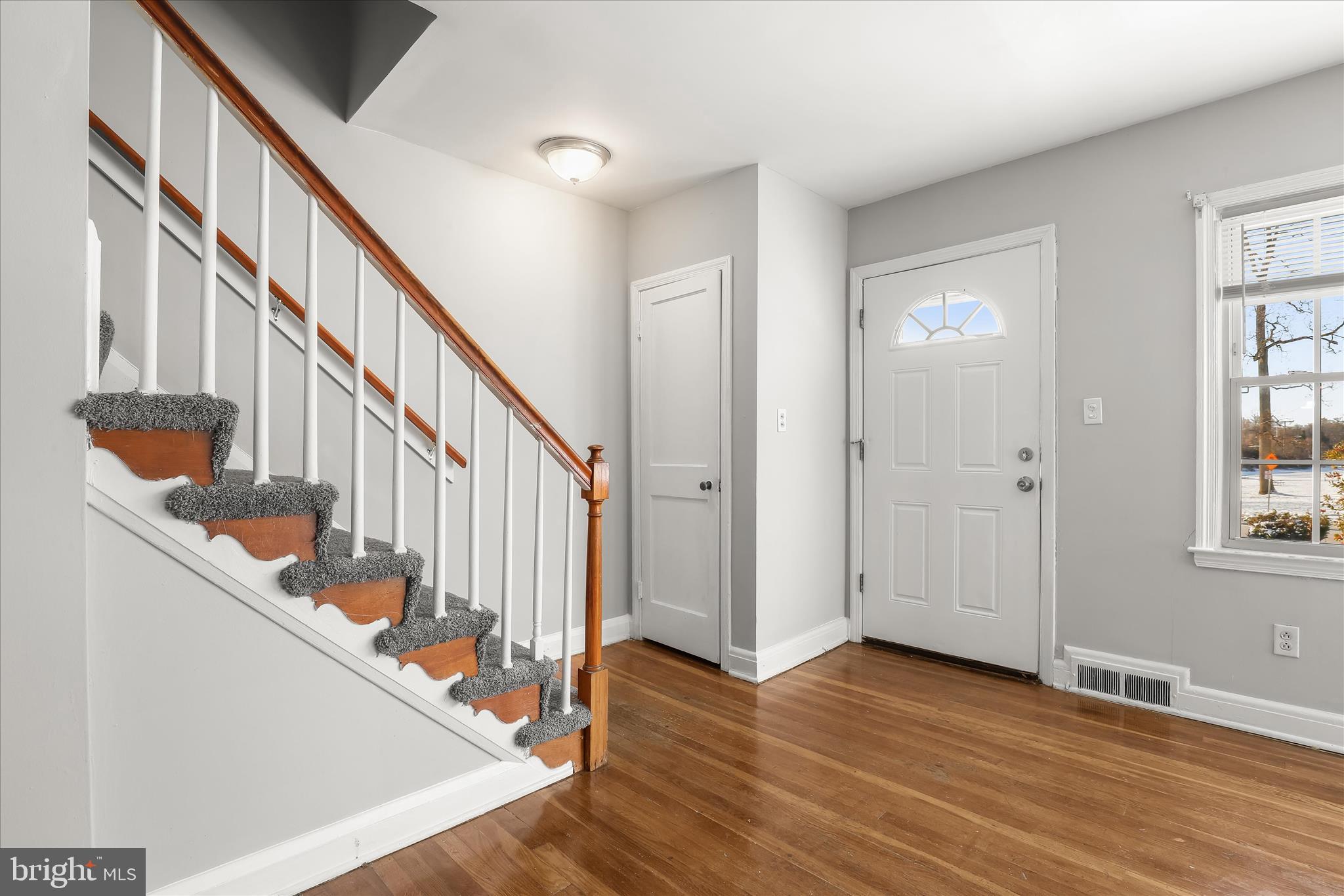1945 Edgewood Road Towson, MD 21286 - Photo 5 of 46 a view of an entryway with wooden floor and stairs