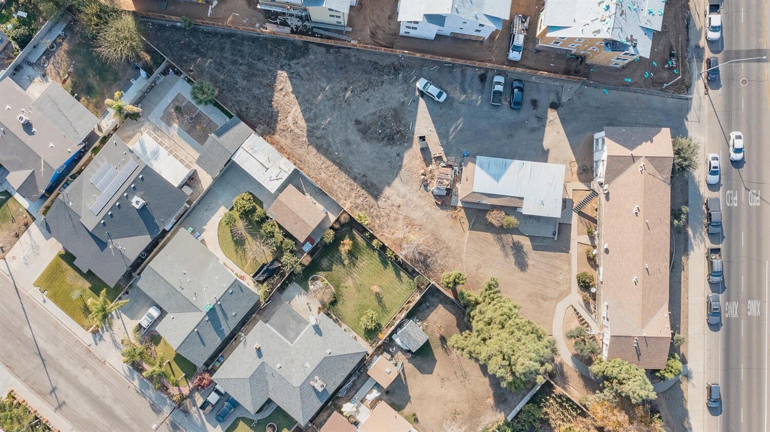 655 East 11th Street Reedley, CA 93654 - Photo 12 of 13 an aerial view of a house with a garden