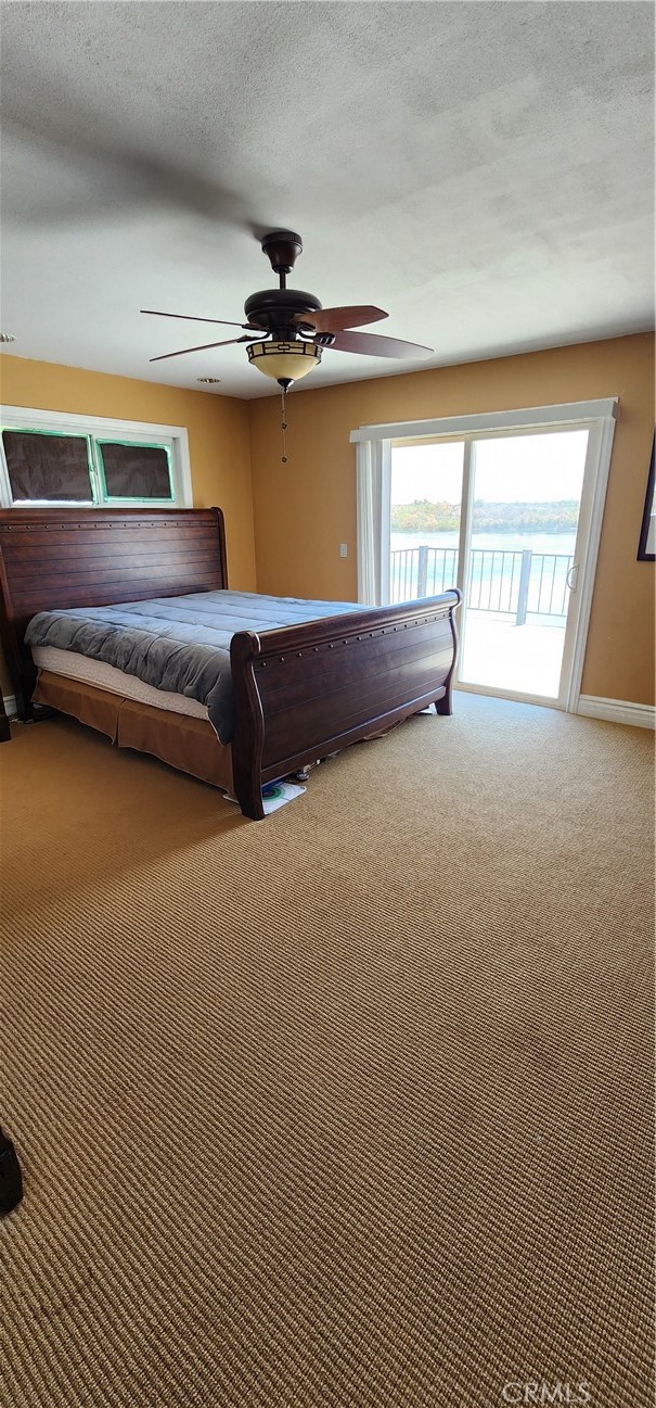 10 Rio Loco Blythe, CA 92225 - Photo 27 of 36 Primary bedroom has ensuite bathroom and slider to upstairs balcony