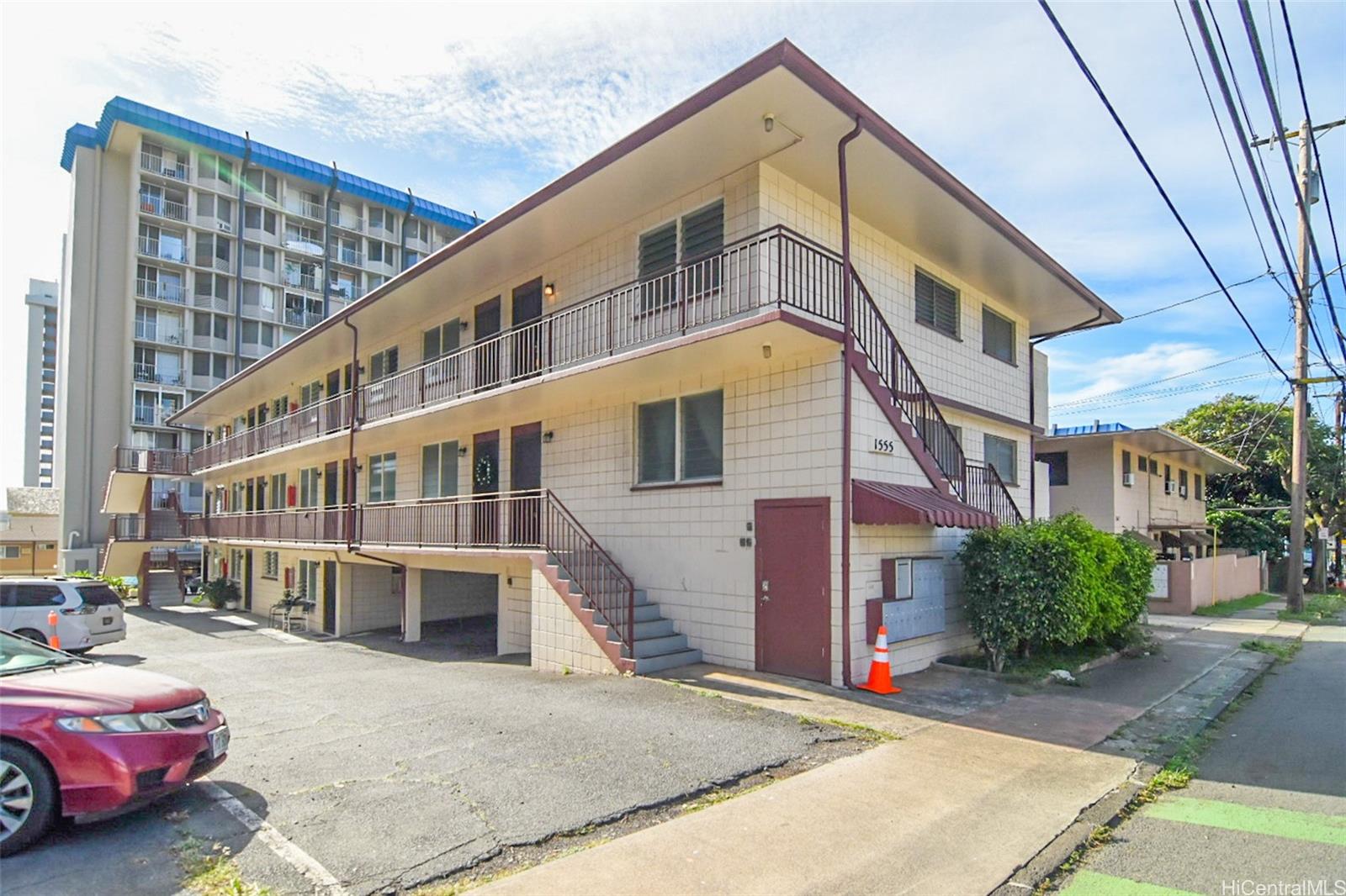 1555 Pensacola Street, Unit 302 Honolulu, HI 96822 - Photo 11 of 11 a front view of a building with street