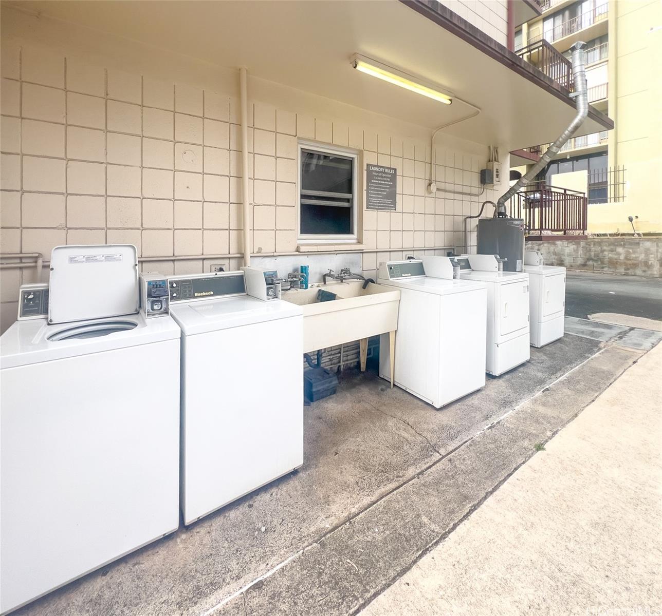 1555 Pensacola Street, Unit 302 Honolulu, HI 96822 - Photo 10 of 11 a room with storage and utility