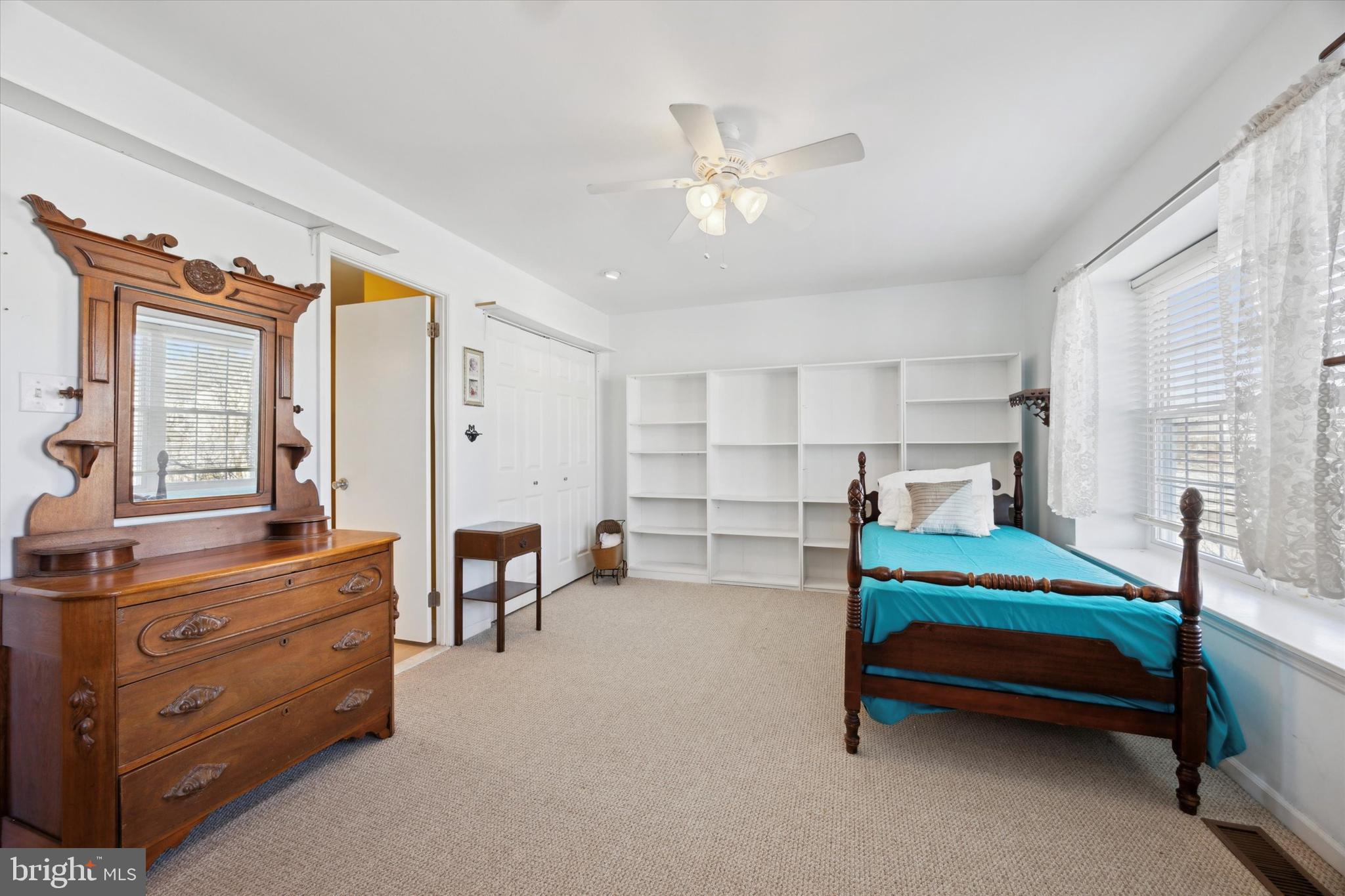 72 Victoria Drive Aston, PA 19014 - Photo 14 of 25 a bedroom with furniture and windows