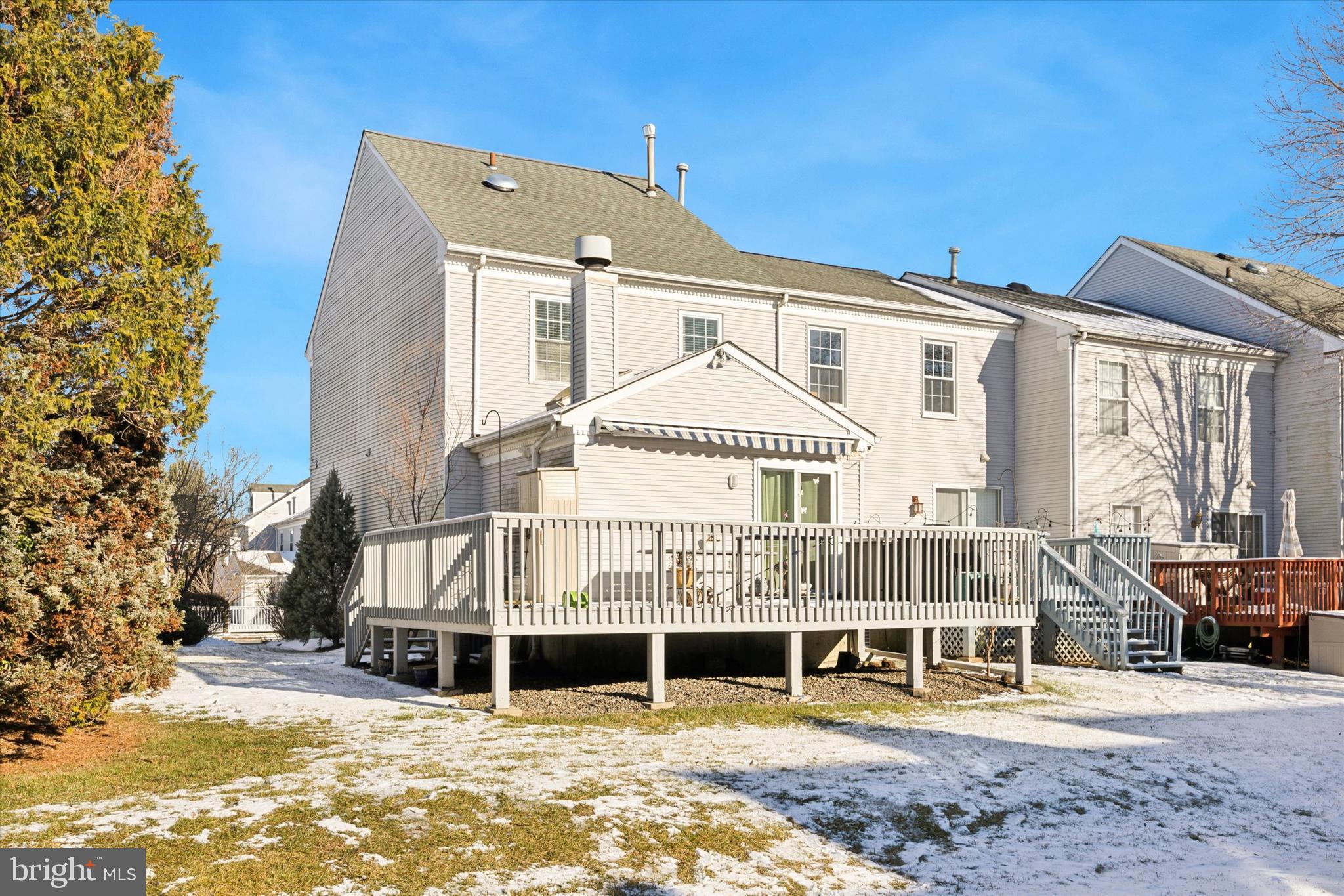 72 Victoria Drive Aston, PA 19014 - Photo 25 of 25 a view of a house with large windows and wooden fence