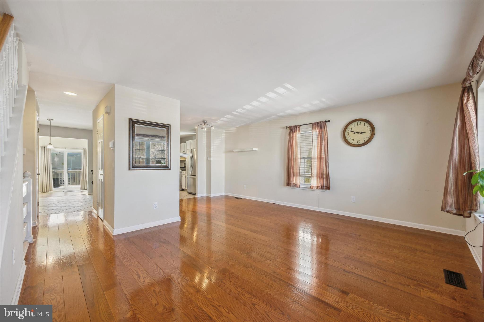 72 Victoria Drive Aston, PA 19014 - Photo 3 of 25 a view of livingroom with hardwood floor and front door