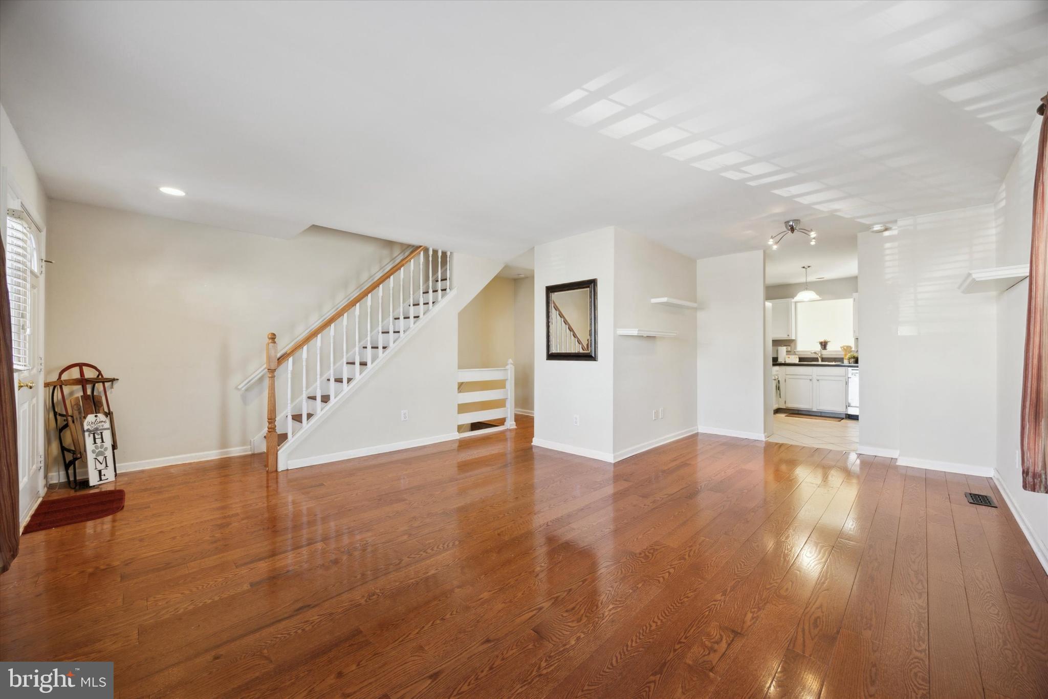 72 Victoria Drive Aston, PA 19014 - Photo 4 of 25 a view of an empty room with wooden floor