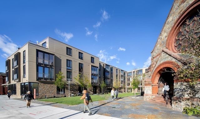 a front view of a building with street view