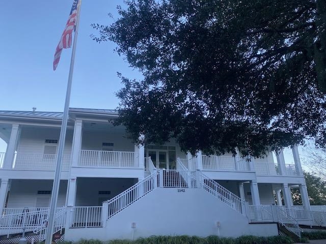 18 Canvasback Cove, Unit 122 Georgetown, SC 29440 - Photo 26 of 32 View of apartment building / complex featuring stairway