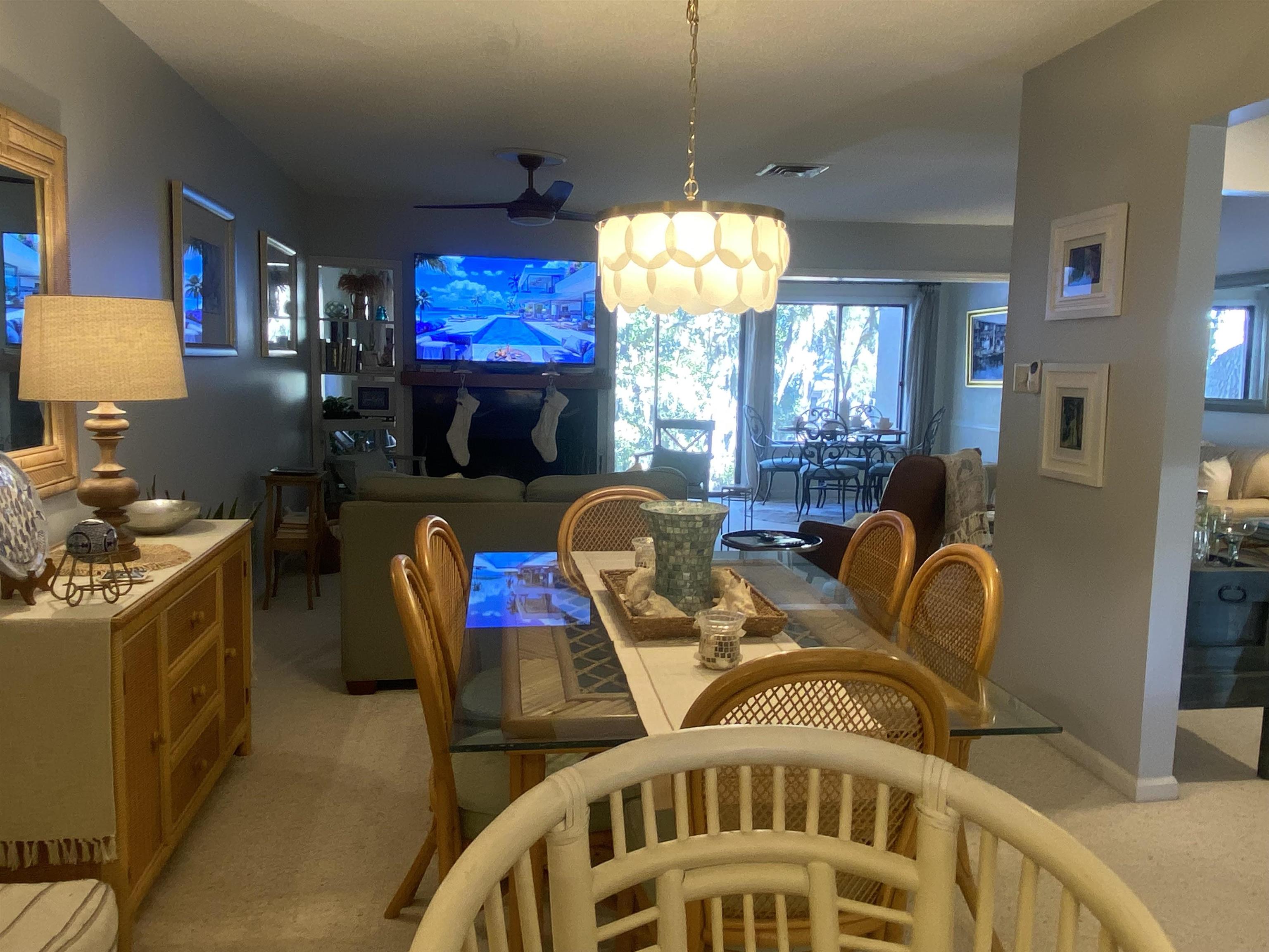 18 Canvasback Cove, Unit 122 Georgetown, SC 29440 - Photo 30 of 32 Dining room with light carpet