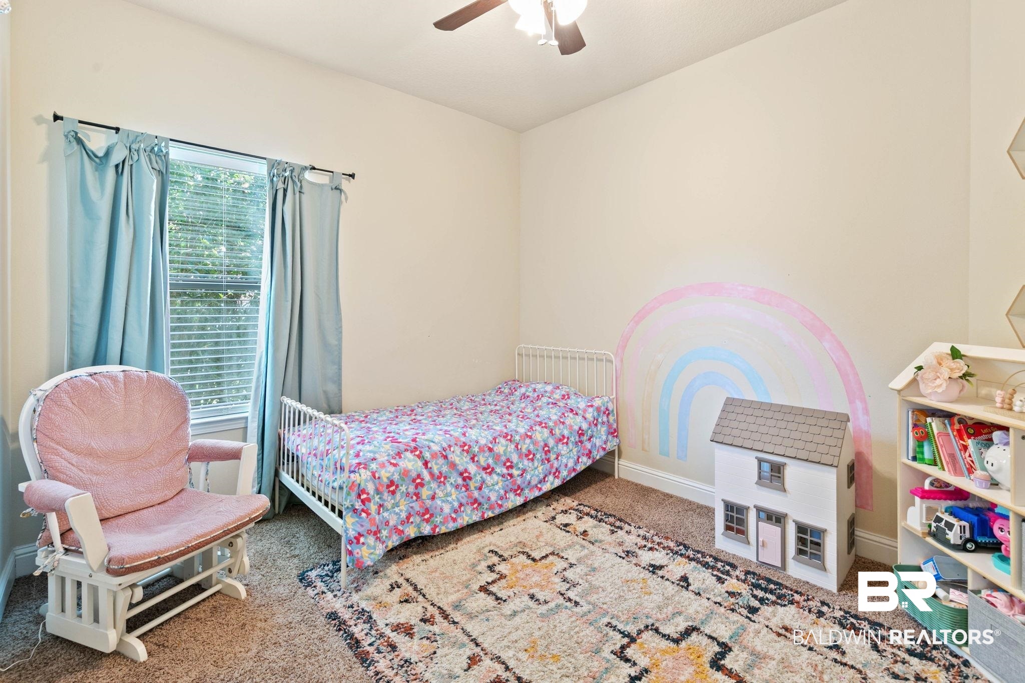 2216 Livingstone Court Mobile, AL 36695 - Photo 32 of 62 Room featuring a window with blinds and blue drapes, light-colored walls, and a ceiling fan